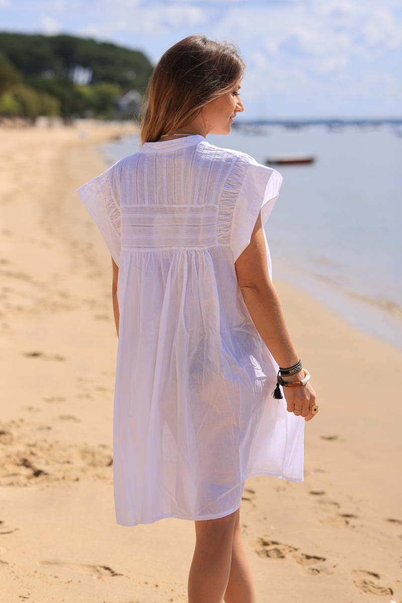 White sleeveless cotton dress with woven detail