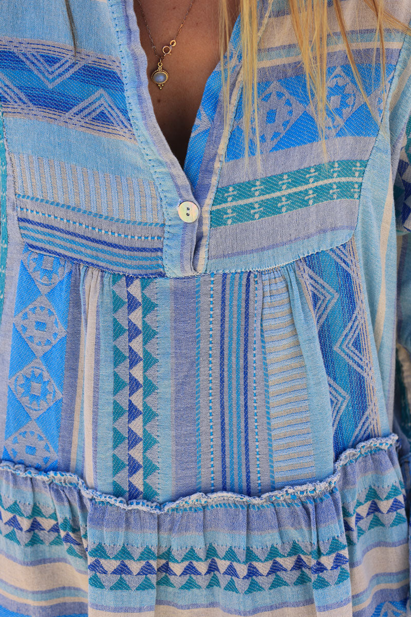 Blue frilled cotton dress with woven aztec print
