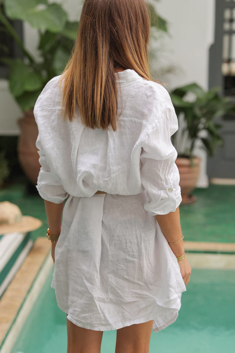 White linen shirt dress with mother of pearl buttons and pockets