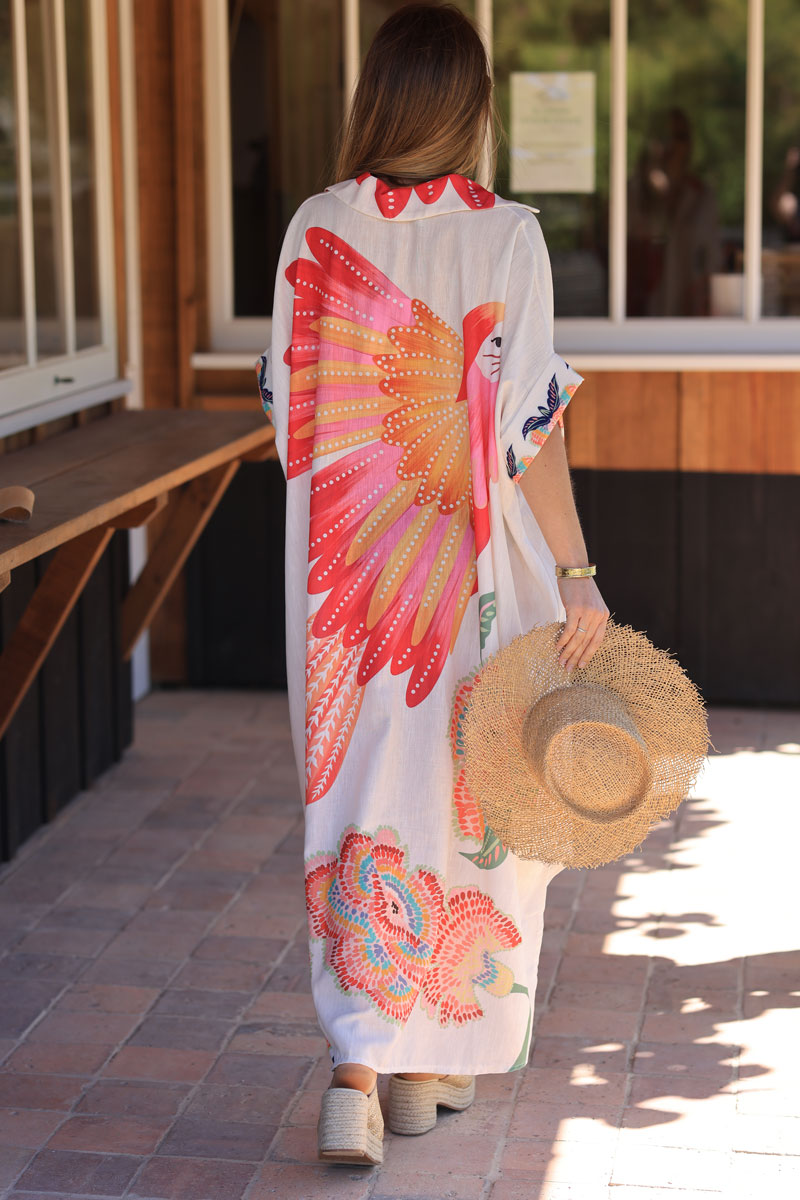 Vestido ancho midi en color crudo con mangas holgadas y estampado de flores y loros de colores