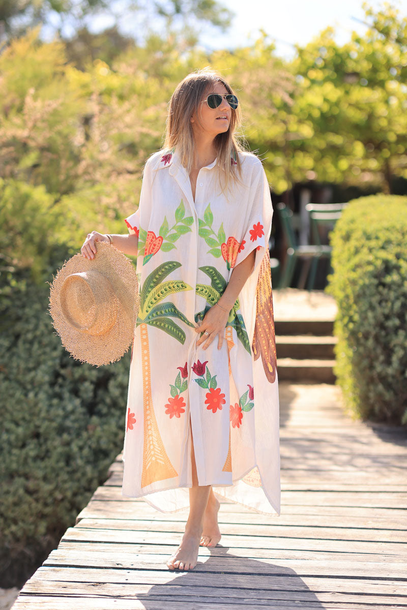 Vestido midi ancho en color crudo con mangas holgadas y coloridos estampados de palmeras tropicales