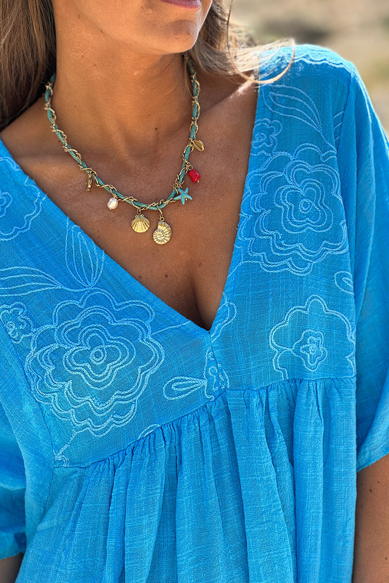 Robe légère bleu en coton haut broderie fine fleurs