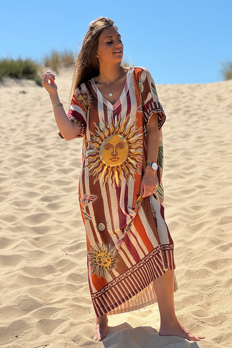 Robe longue brillante et large imprimé soleils rayures camel