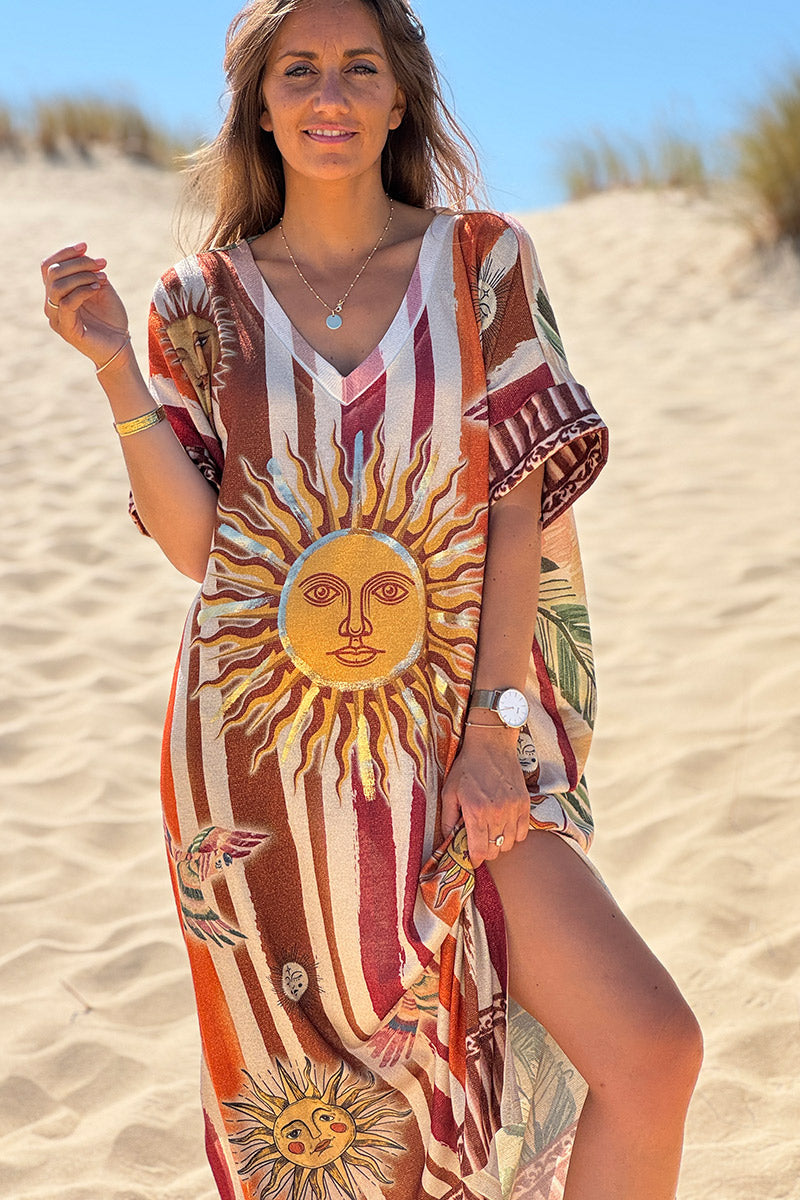 Robe longue brillante et large imprimé soleils rayures camel