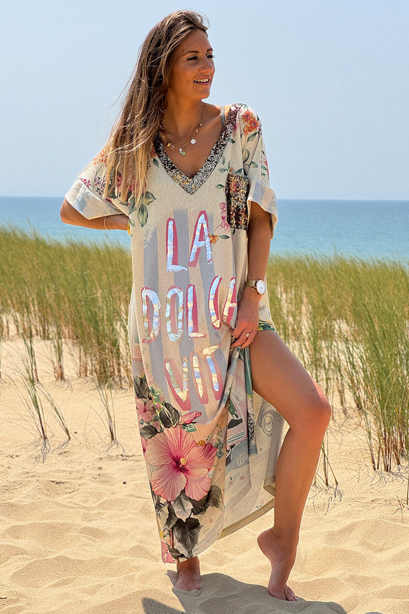 Robe longue brillante motif fleurs et la Dolce Vita rose poche et col sequins