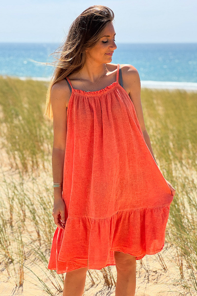 Robe orange à bretelles en coton col élastique bas volants