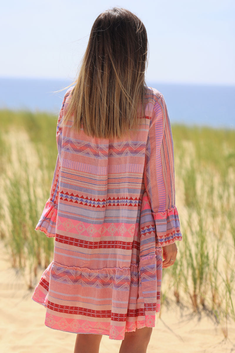 Pink frilled cotton dress with woven aztec print