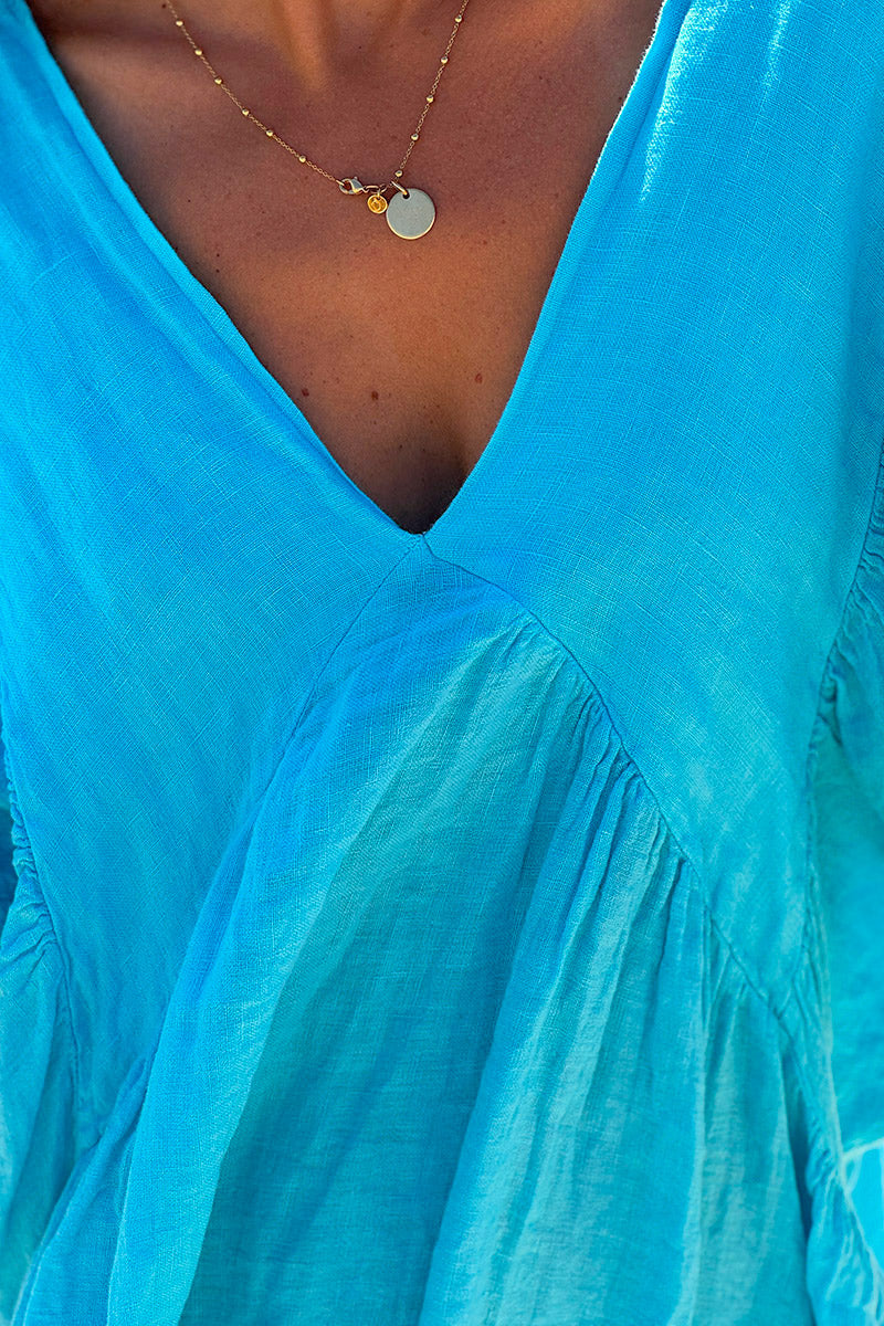 Robe turquoise en lin large manches chauve souris col v