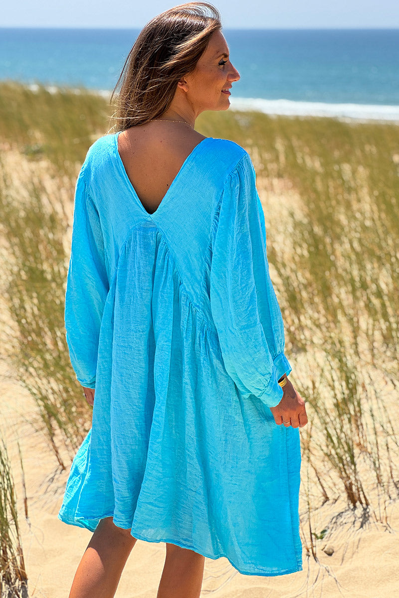Robe turquoise en lin large manches chauve souris col v