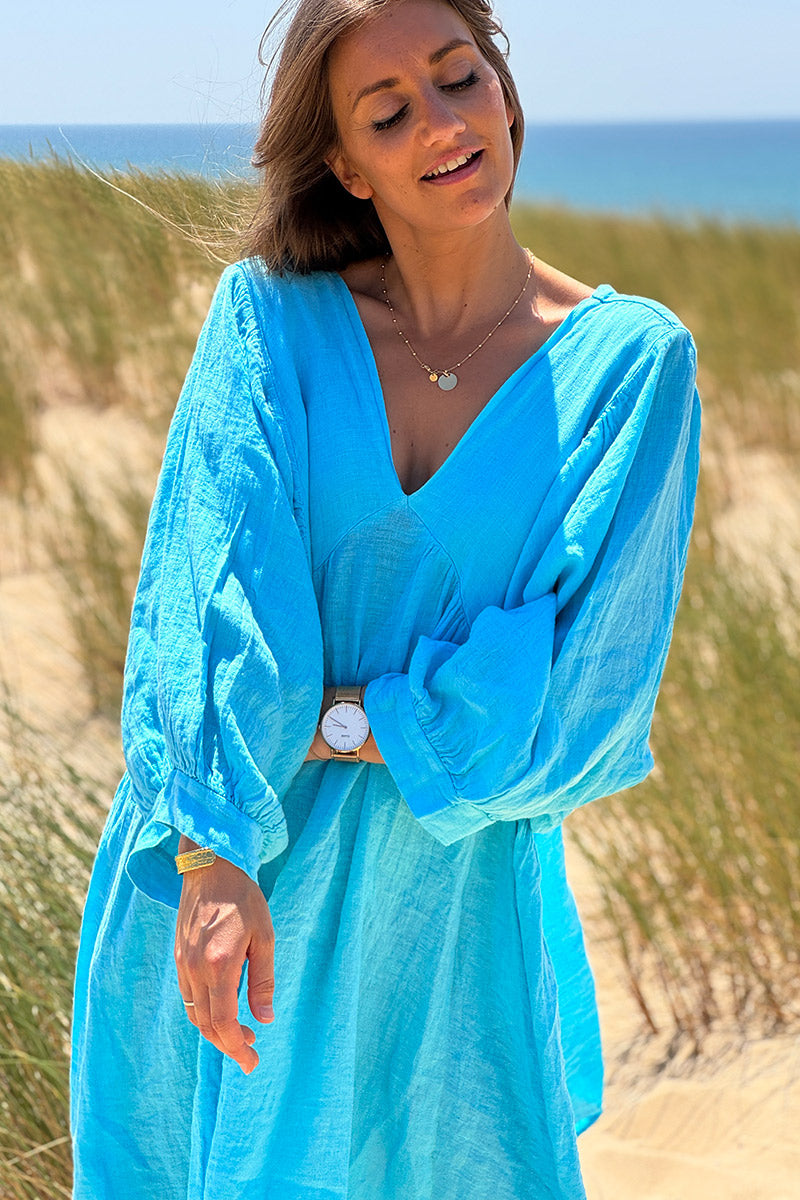 Robe turquoise en lin large manches chauve souris col v