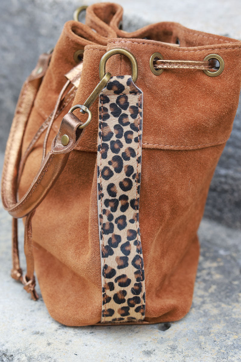 Camel suede leather bucket bag with leopard sides and glossy drawstring