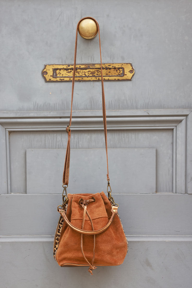 Camel suede leather bucket bag with leopard sides and glossy drawstring