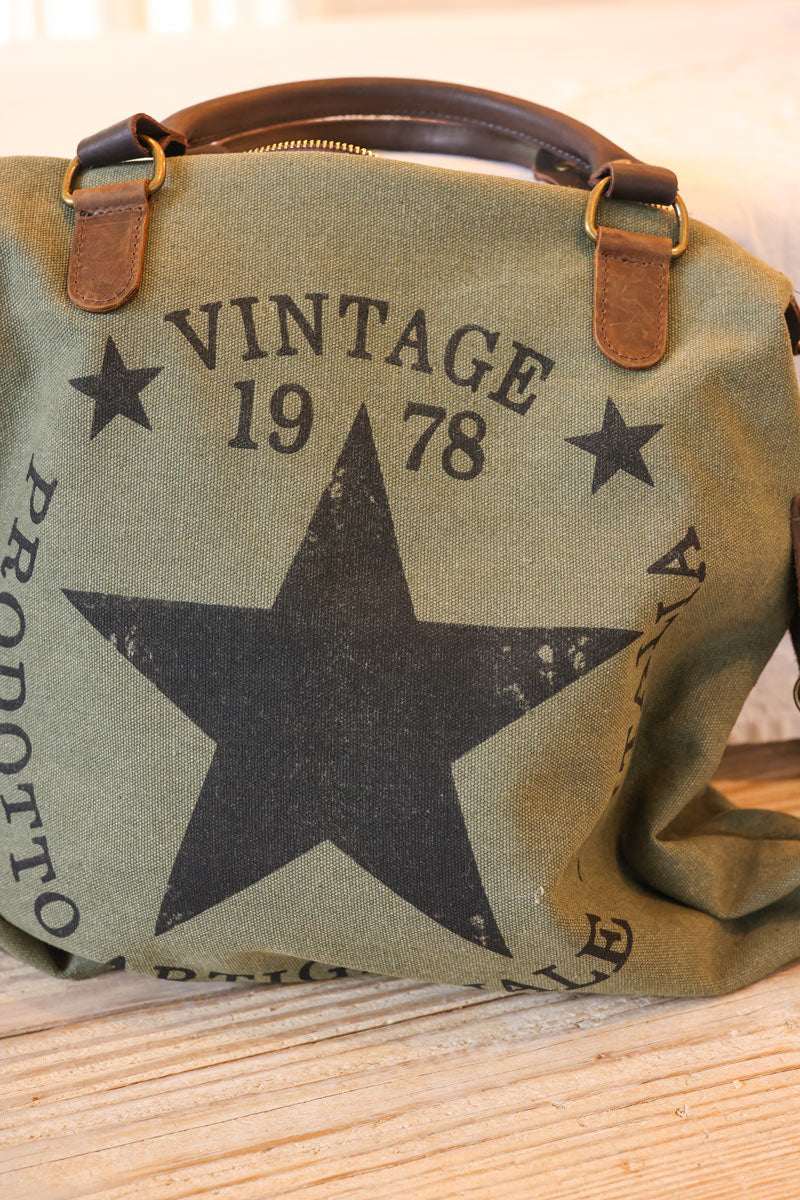 Bolso de mano de algodón caqui y asas de piel con logo de estrella vintage