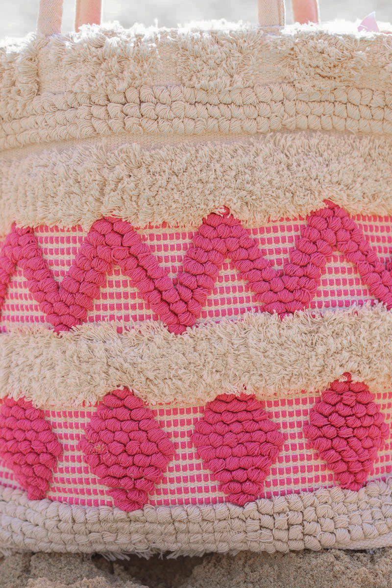 Bolso cesta de algodón crudo con motivos aztecas fucsia en relieve