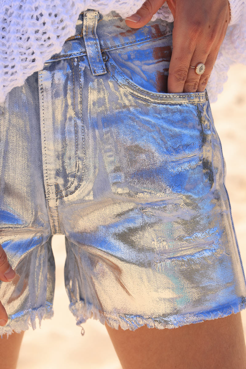 Light washed distressed denim shorts with silver coated finish