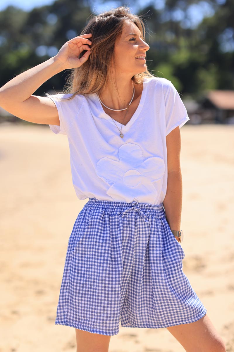 Pantalón corto de algodón suave con estampado de cuadros vichy azules y cinturilla elástica