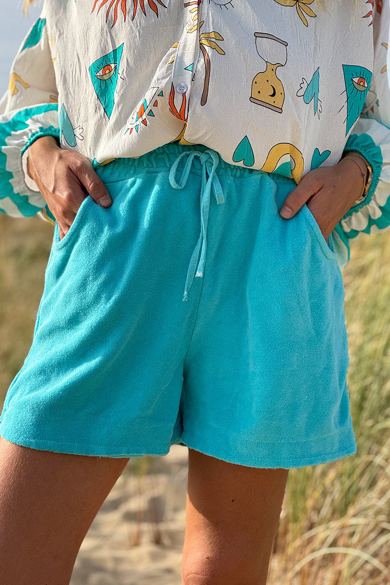 Shorts turquesa confort en suave tejido de rizo con cinturilla elástica