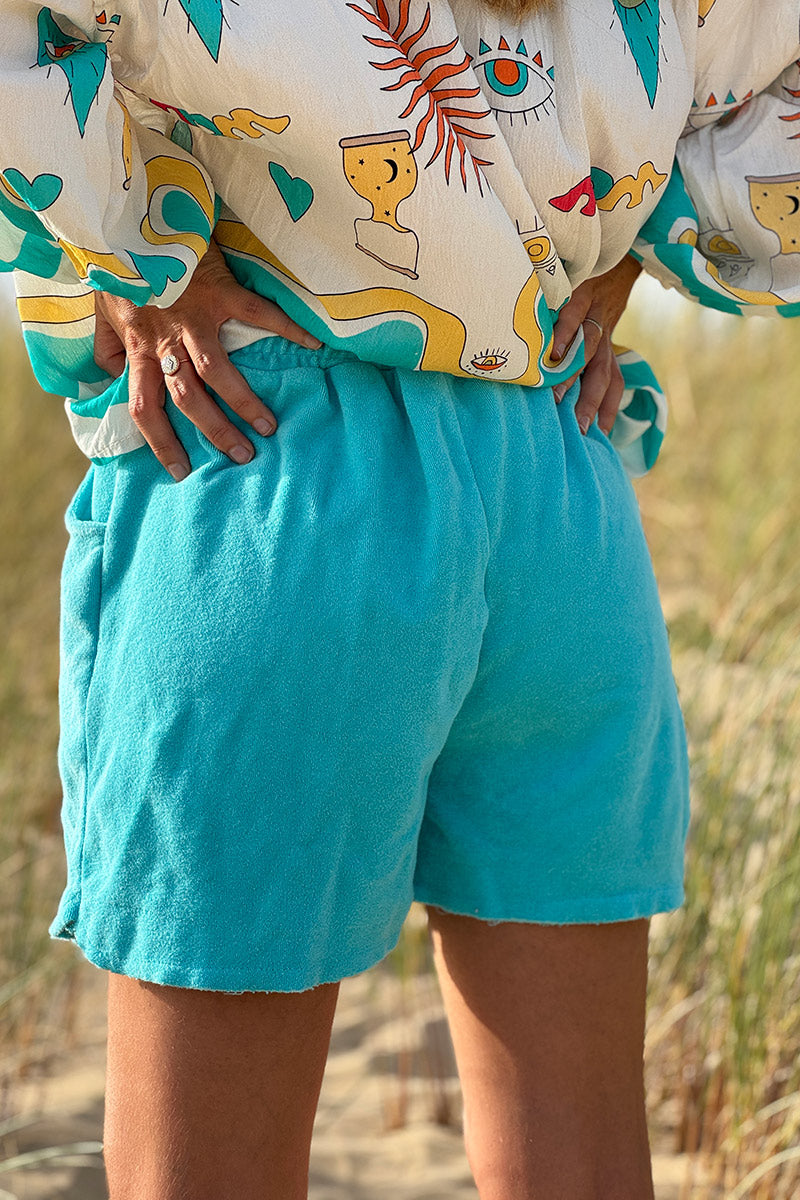 Shorts turquesa confort en suave tejido de rizo con cinturilla elástica