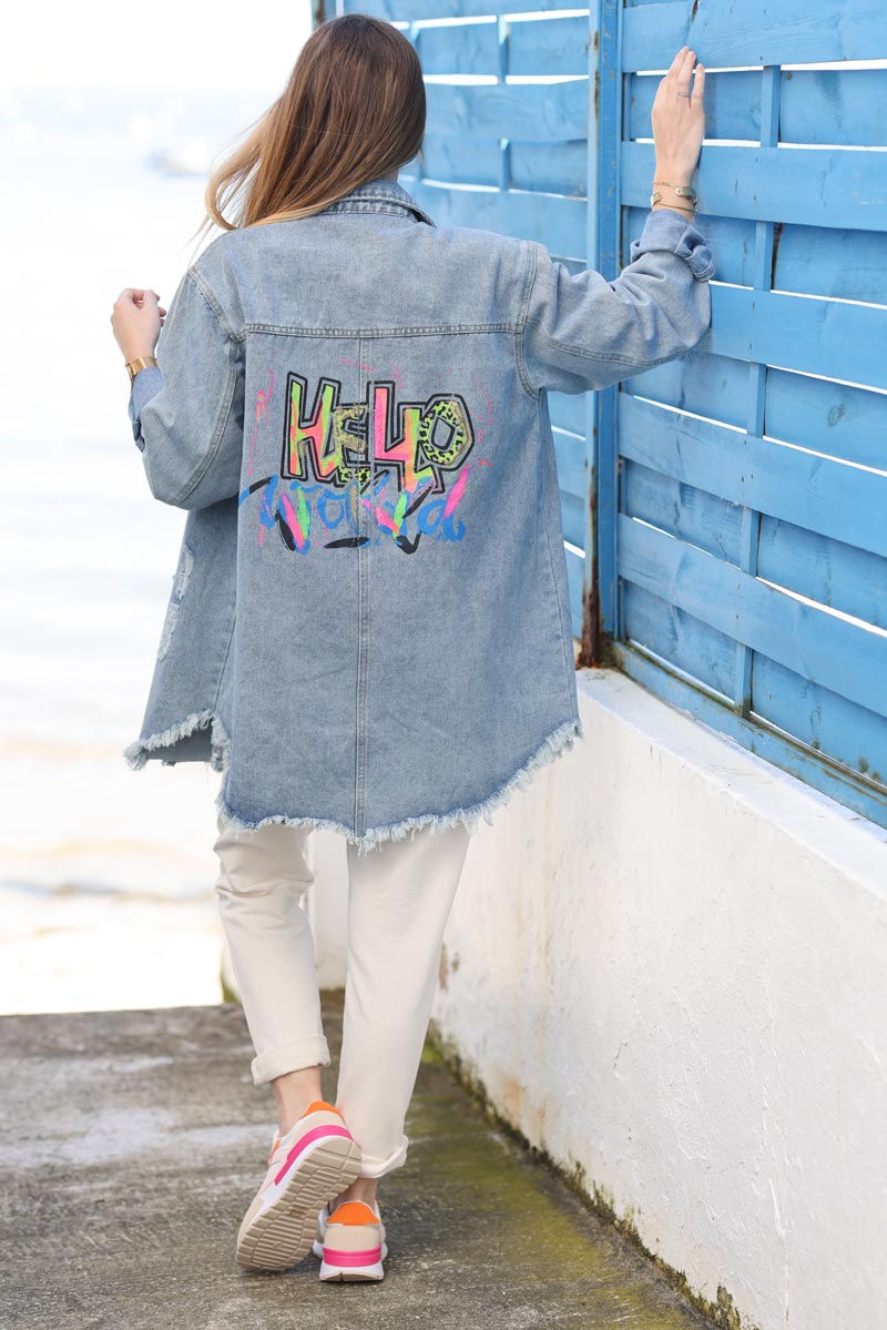 Washed denim shirt jacket with raw frayed hems and fluo 'Hello World'