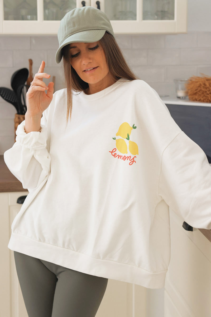 Sudadera blanca grande y cómoda con motivo de limón descolorido