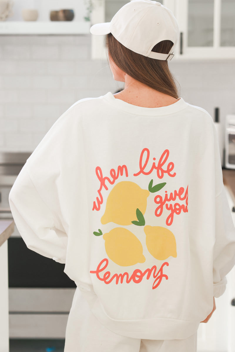 Sudadera blanca grande y cómoda con motivo de limón descolorido