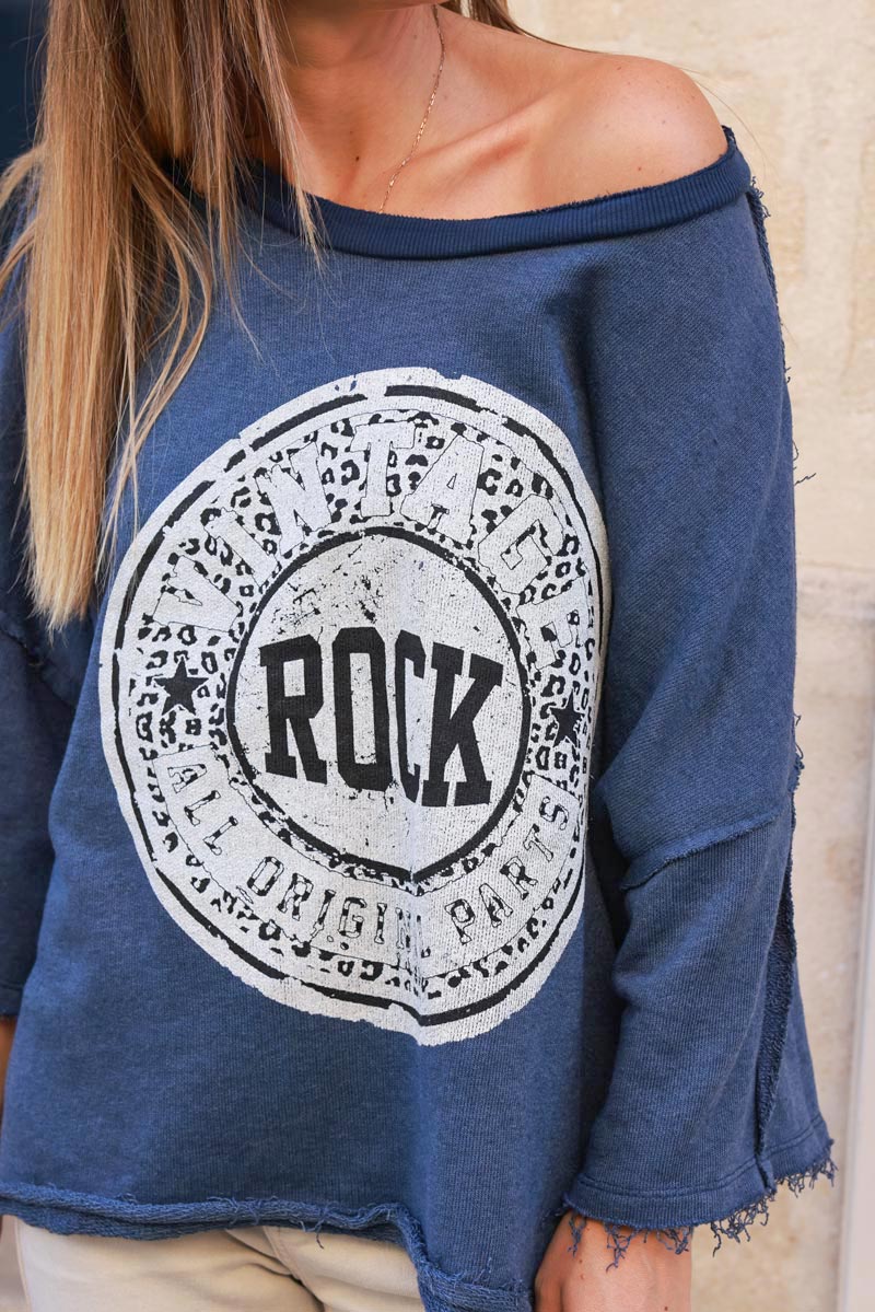 Sweat loose bleu jean logo rock léopard manches chauve souris finitions franges