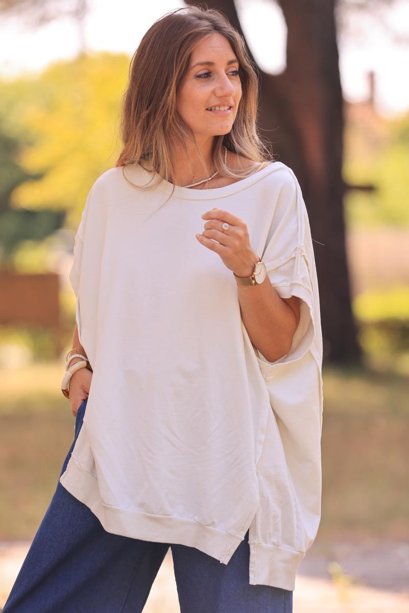 Off white loose sleeveless sweater with seams detail