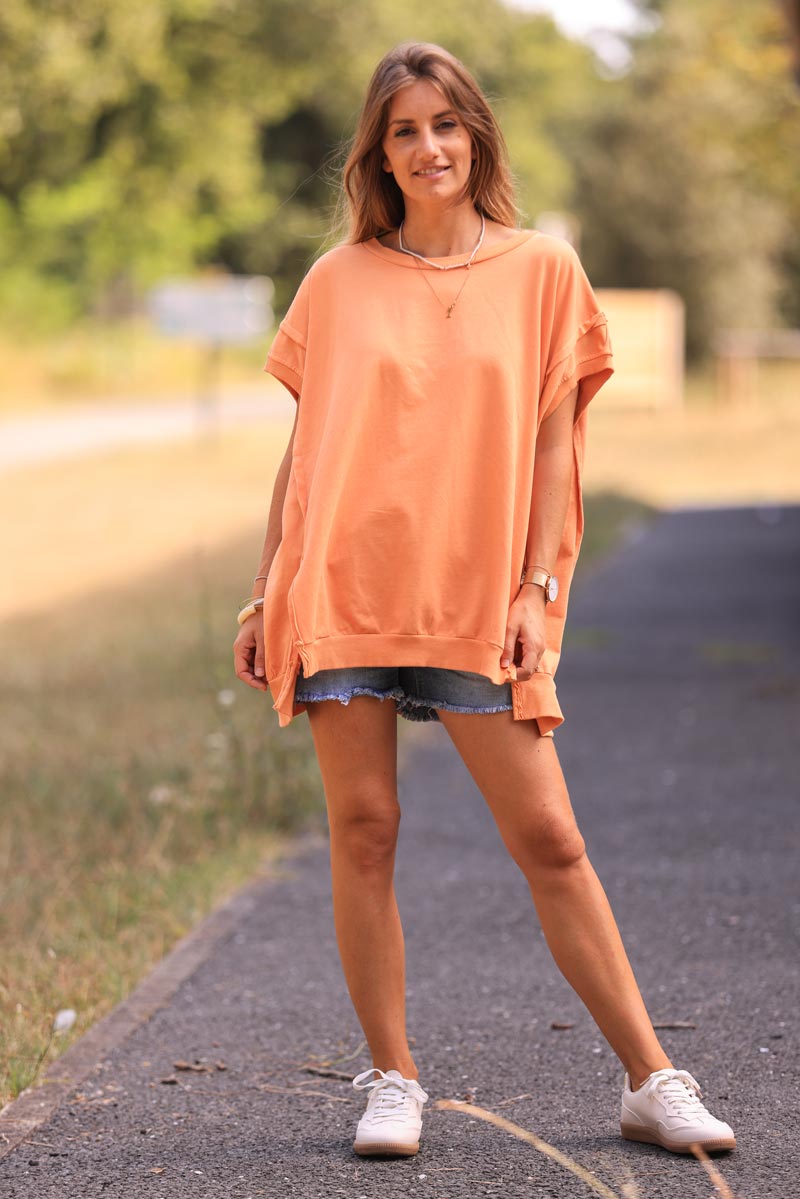 Sweat loose sans manches orange pastel coutures apparentes