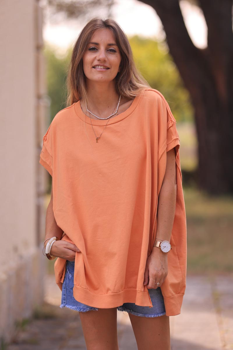 Sweat loose sans manches orange pastel coutures apparentes