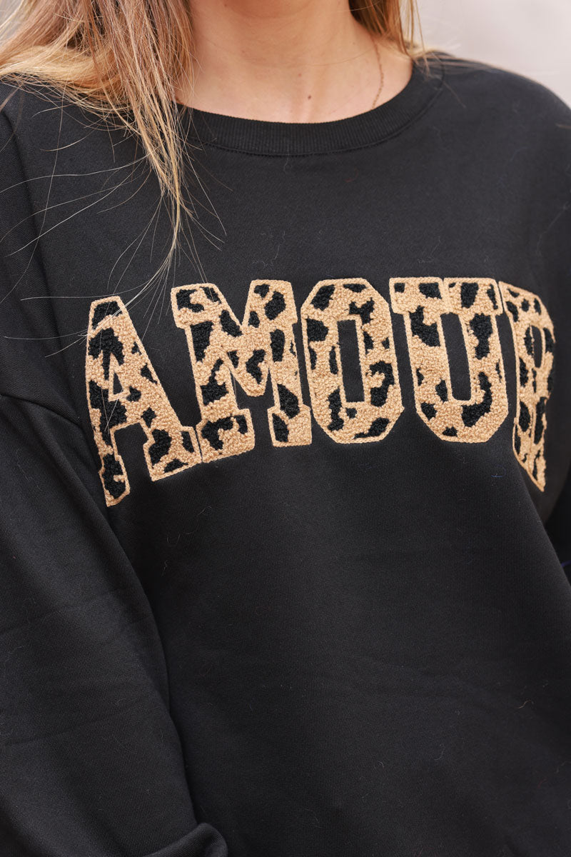 Sudadera negra con bordado de rizo leopardo Amour