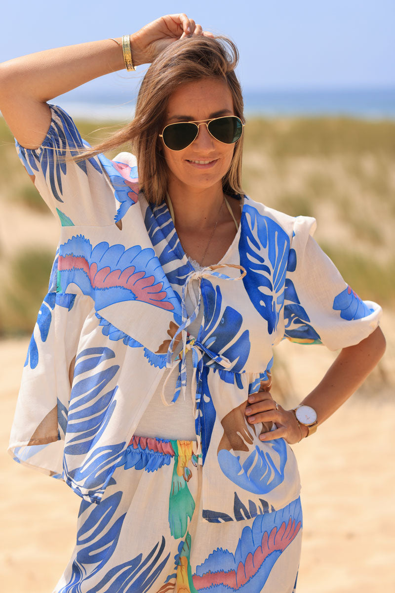 Ecru tie front blouse with blue watercolor palm and parrot print