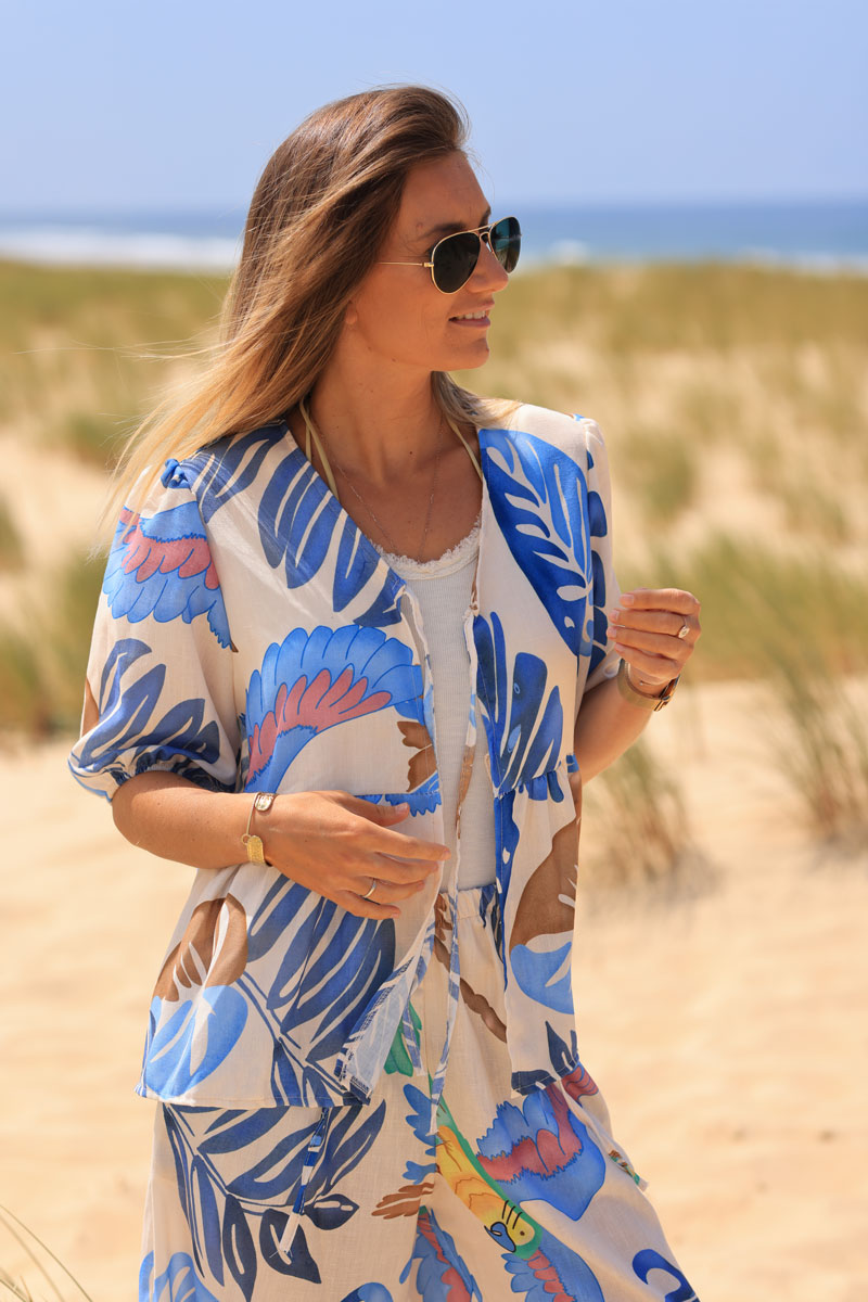 Ecru tie front blouse with blue watercolor palm and parrot print