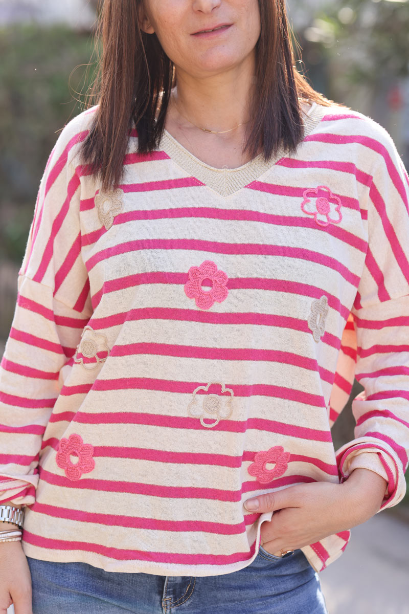 Fuchsia striped sweater with embroidered flowers