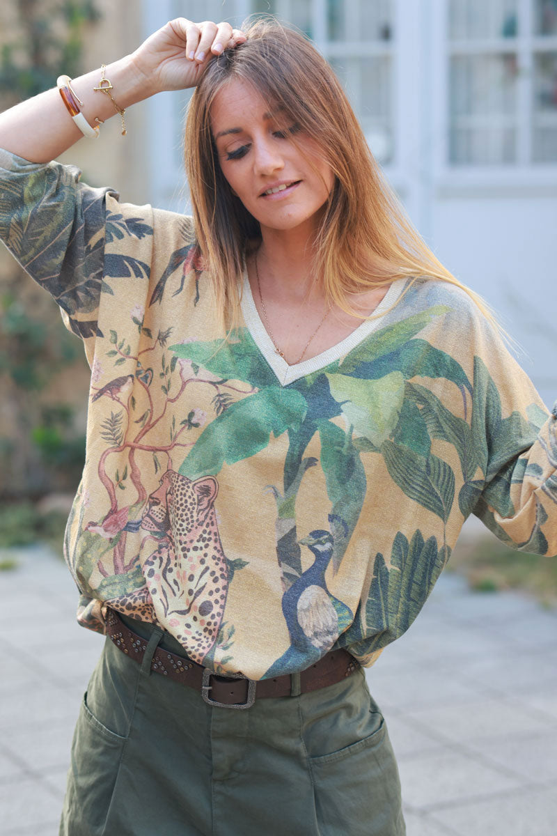 Shiny v-neck top with leopard, peacock, and palm print