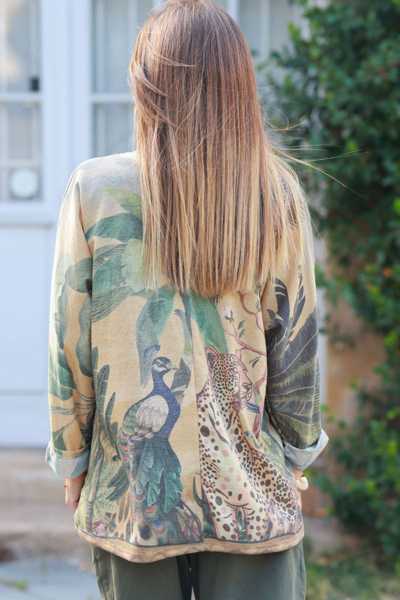 Shiny v-neck top with leopard, peacock, and palm print