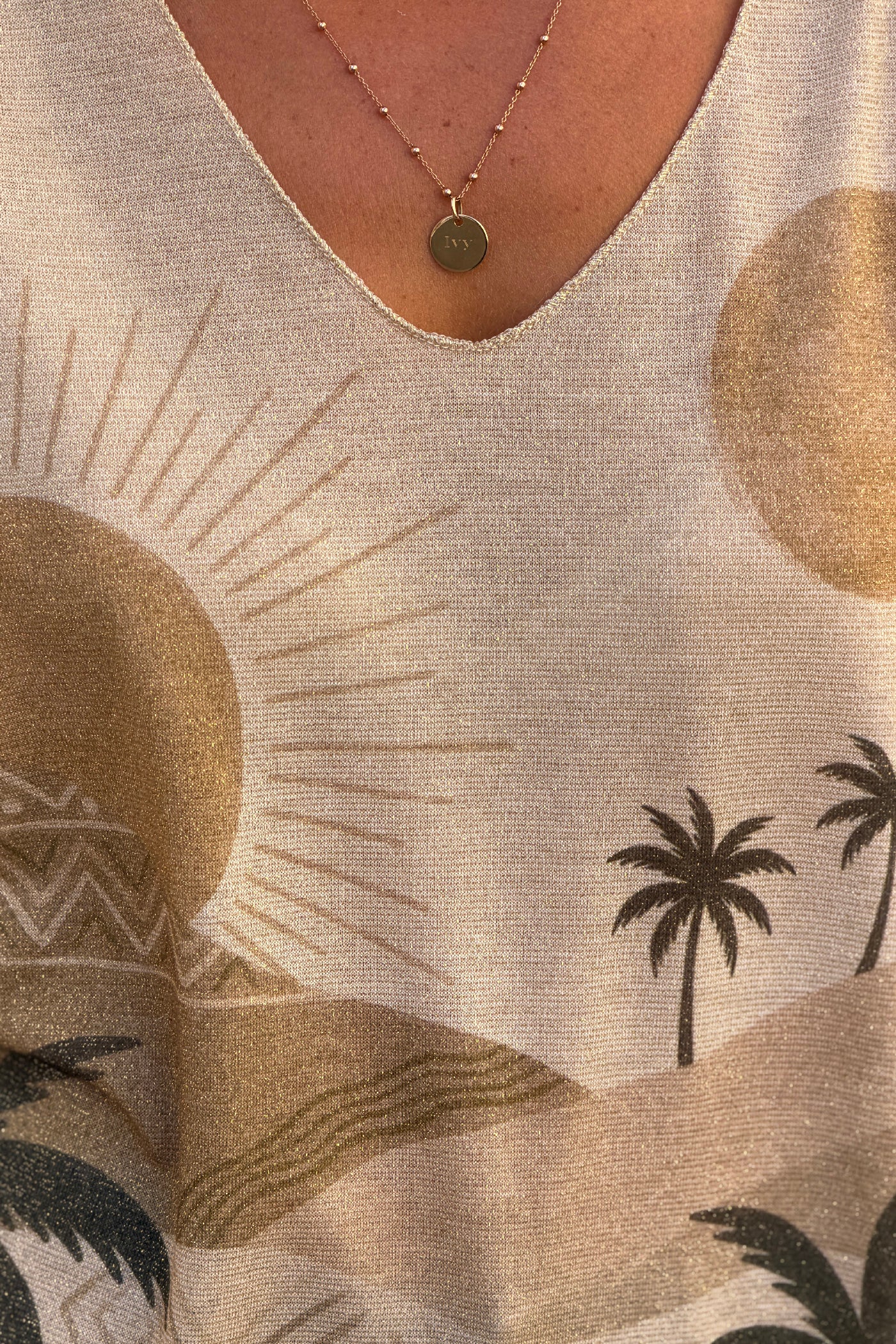 Top brillant imprimé Sunset kaki soleil dunes et palmiers