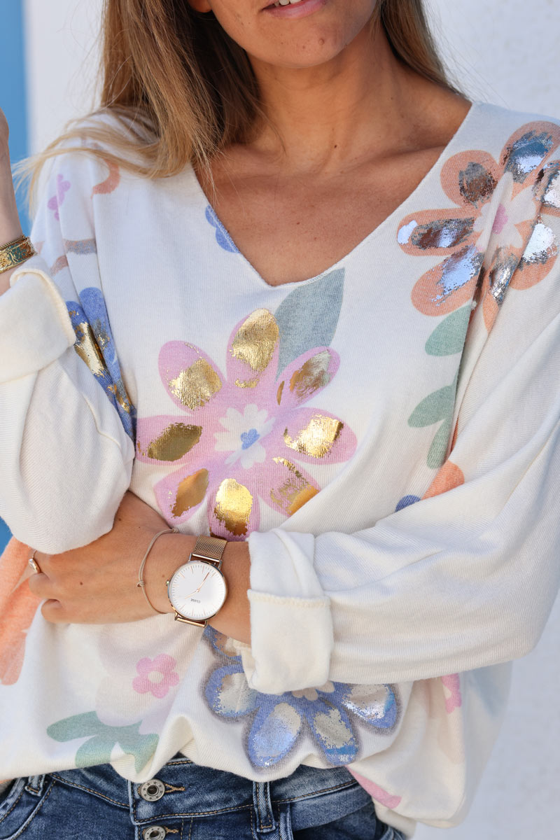 Ecru jersey jumper with daisy print in blue orange pastel tones