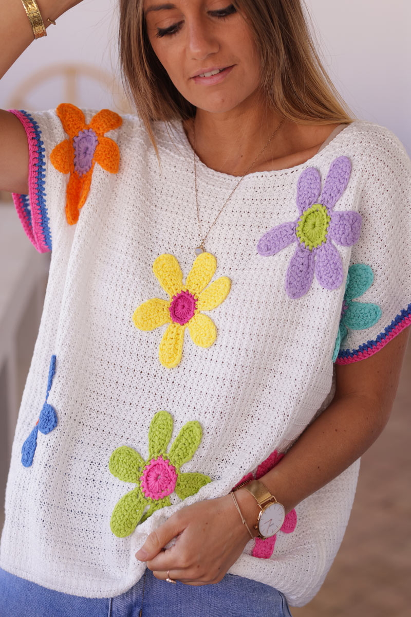White crochet short sleeve top with colourful flowers