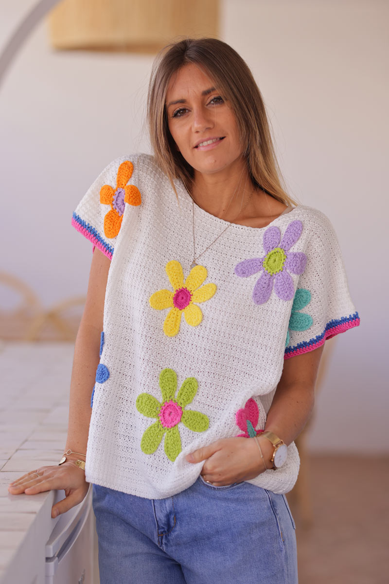 White crochet short sleeve top with colourful flowers