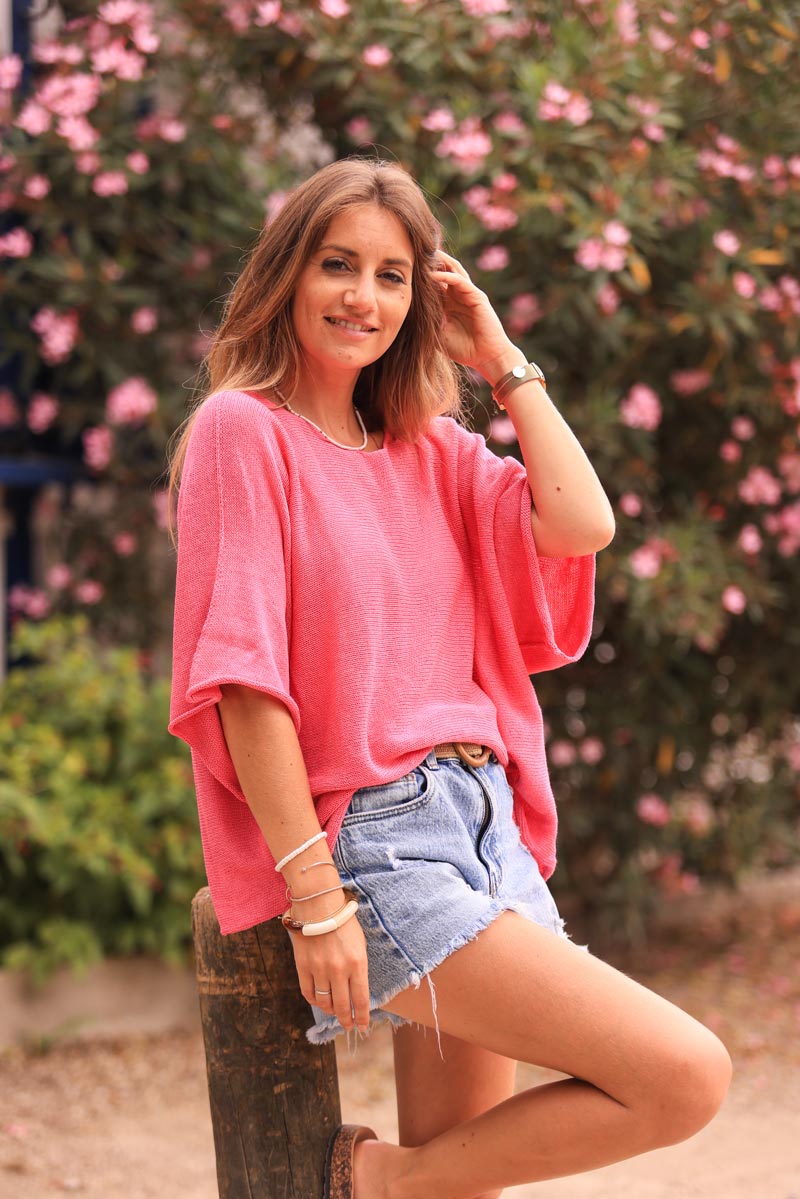 Top de punto de algodón fucsia con cuello redondo y manga murciélago