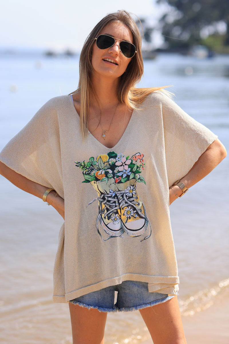 Golden floaty fine knit top with sneakers and flower print