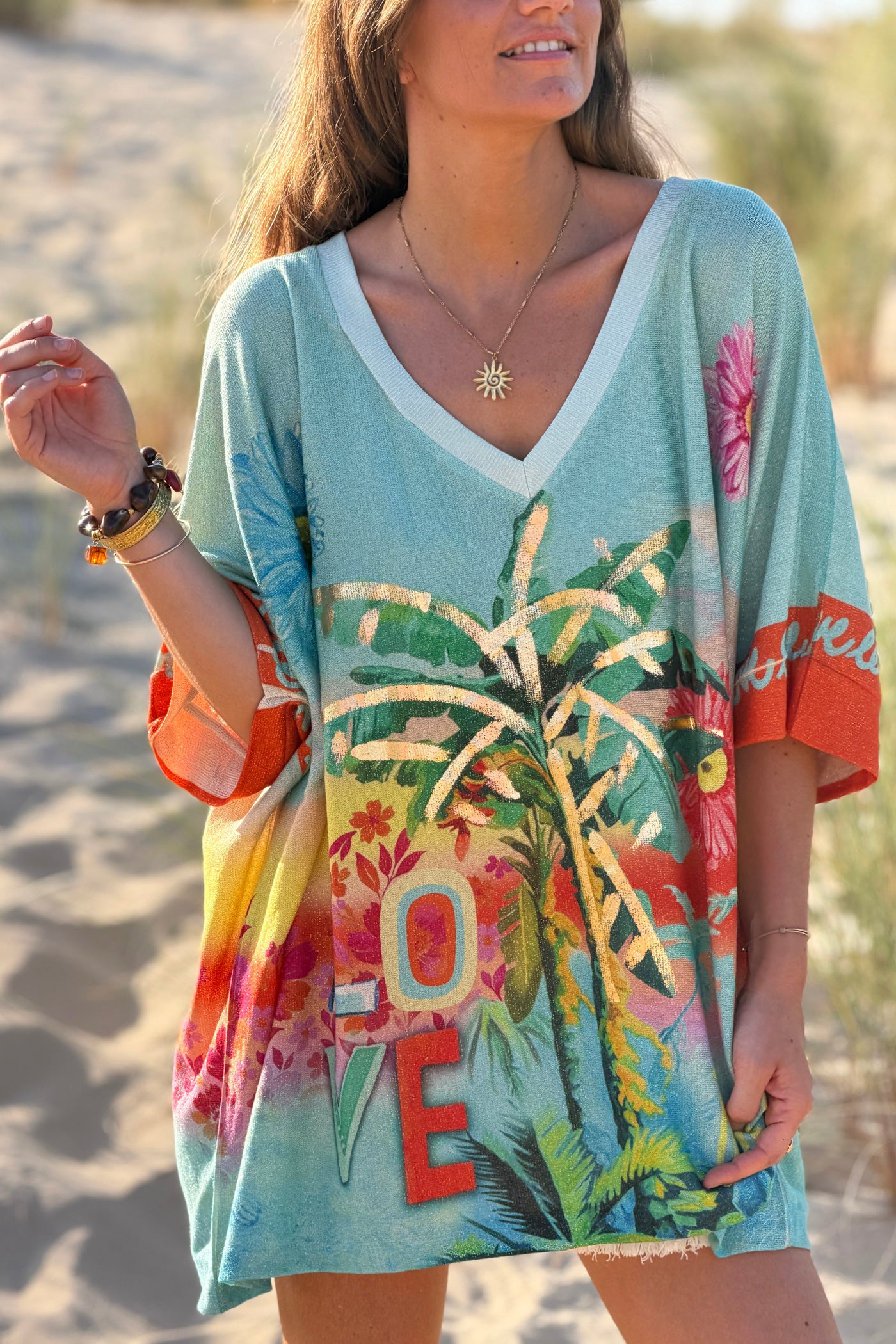 Top large turquoise brillant lurex imprimé tropical palmiers