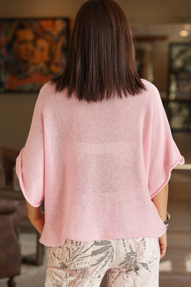 Soft pink cotton knit top with batwing sleeves