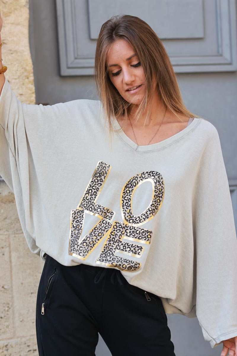 Top stretch large et loose beige manches chauve souris LOVE léopard