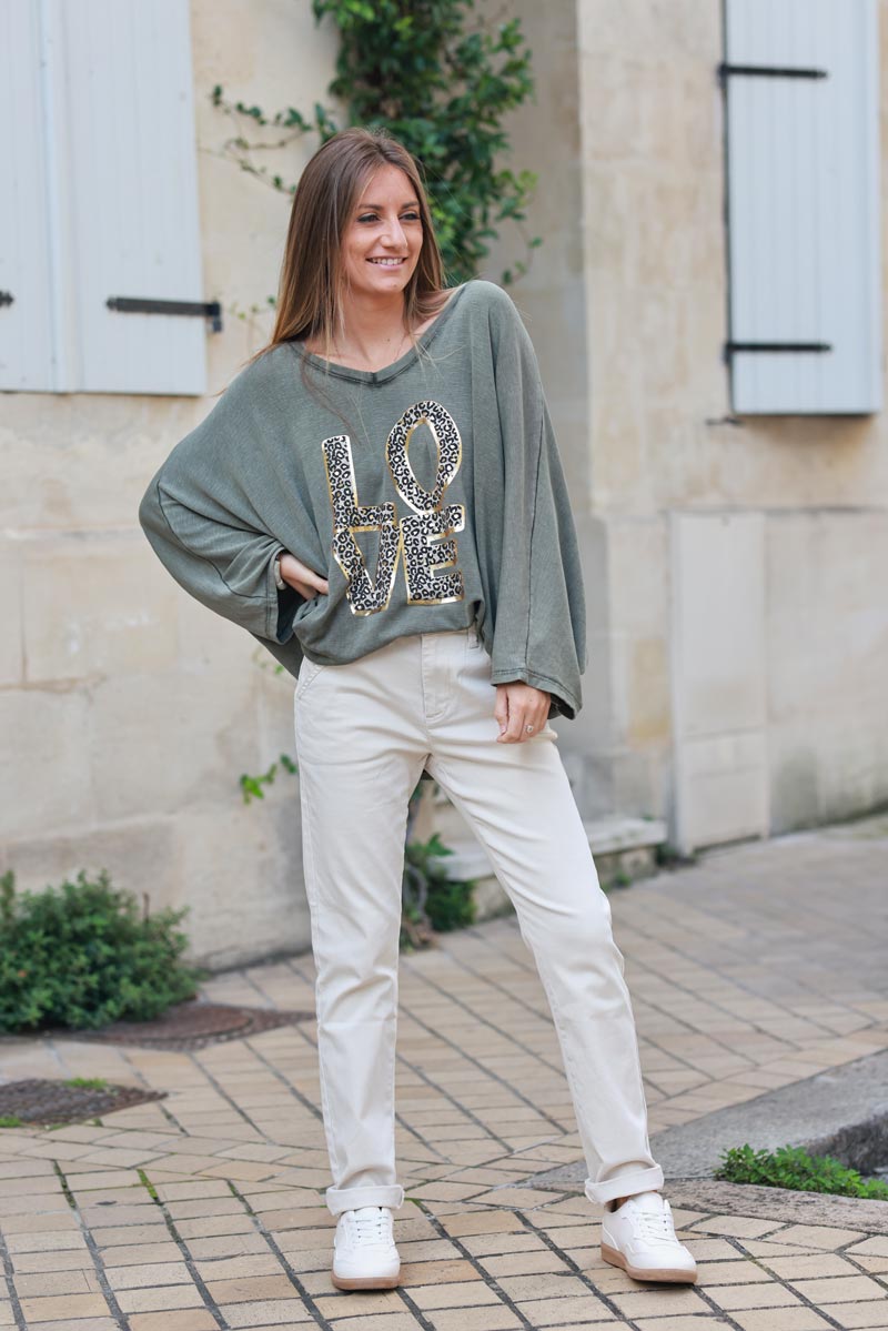 Khaki stretch fine knit batwing top with Love print