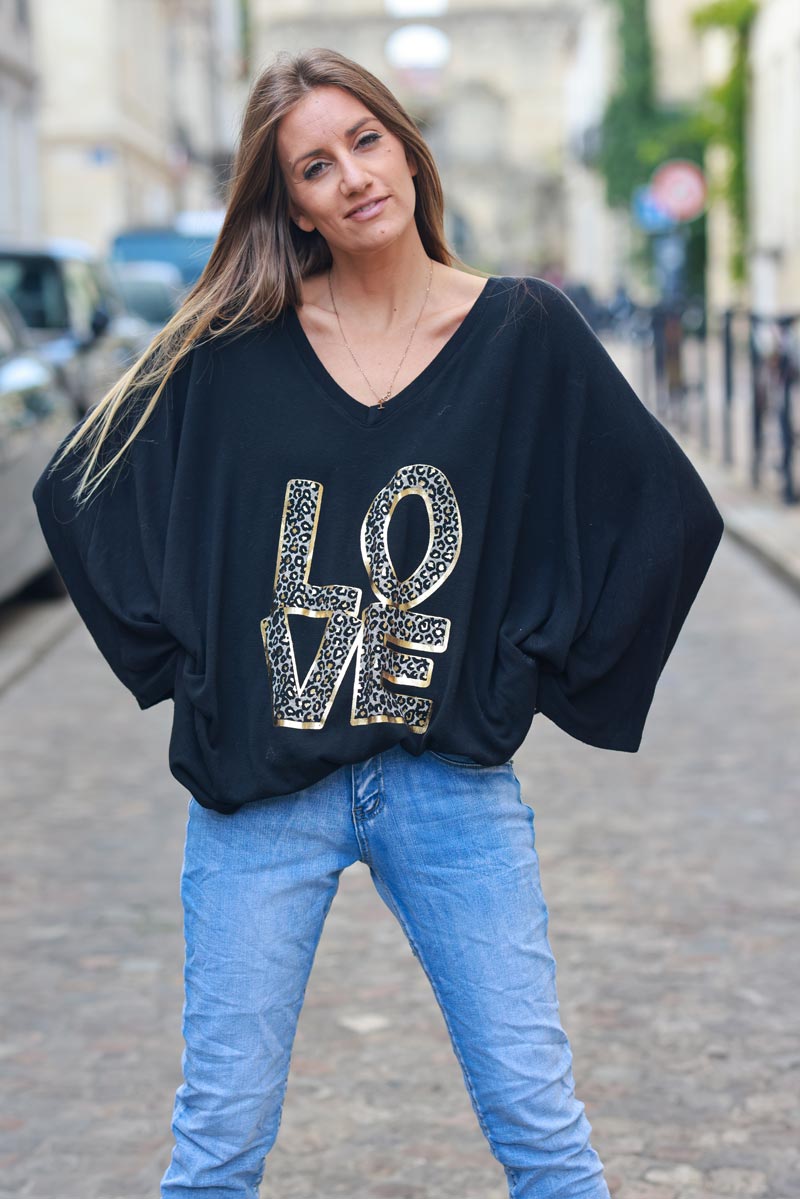 Black stretch fine knit batwing top with Love print