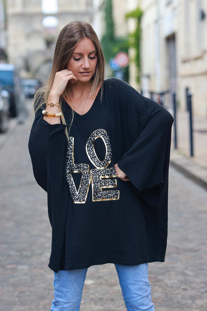 Black stretch fine knit batwing top with Love print