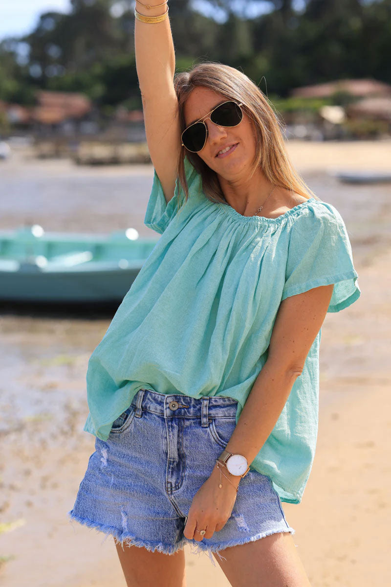 Top turquoise délavé en coton col élastique rond ou bardot