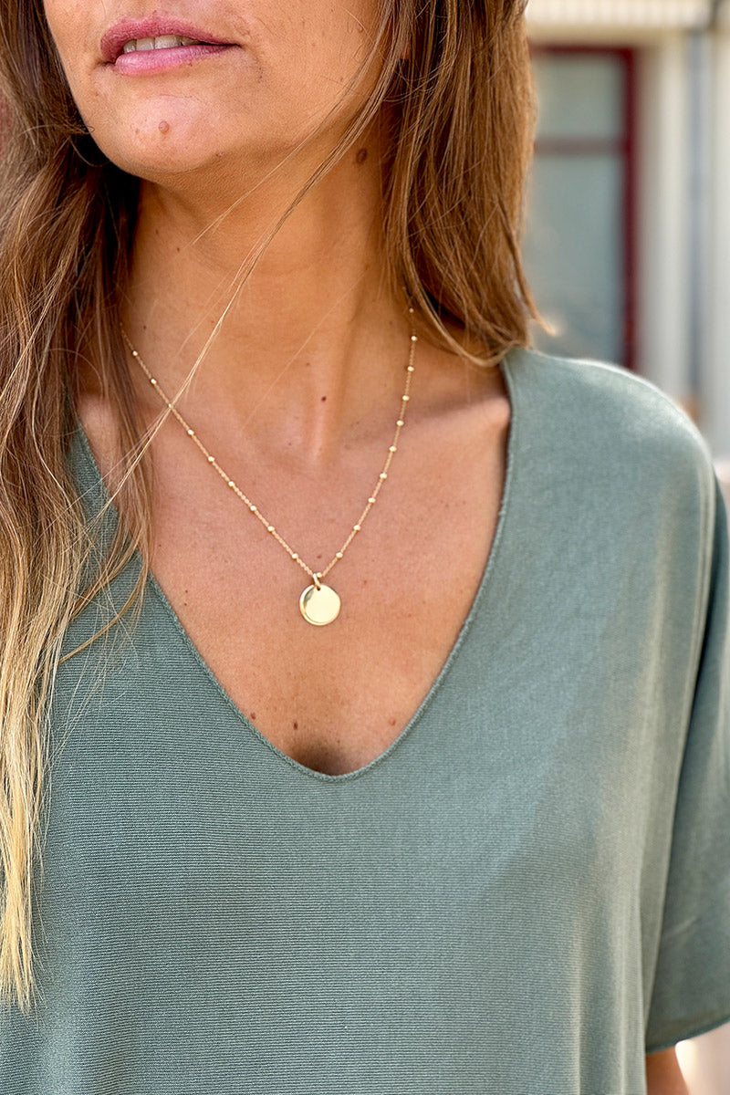 Top fluido caqui confort y elástico con cuello de pico