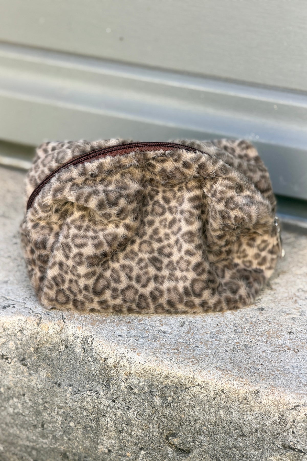 Trousse fausse fourrure léopard beige